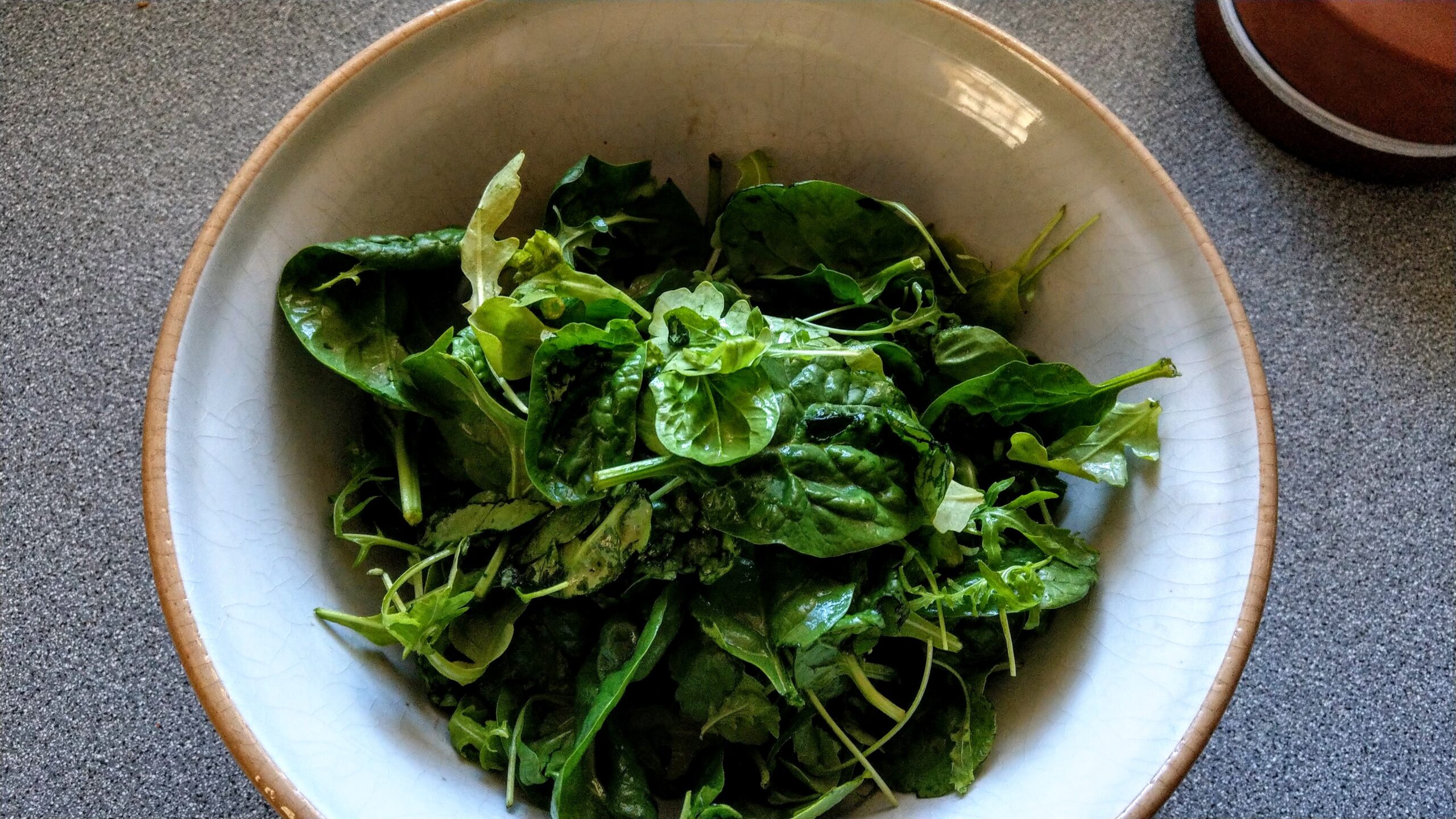 Washed baby spinach, rocket, and lamb's lettuce