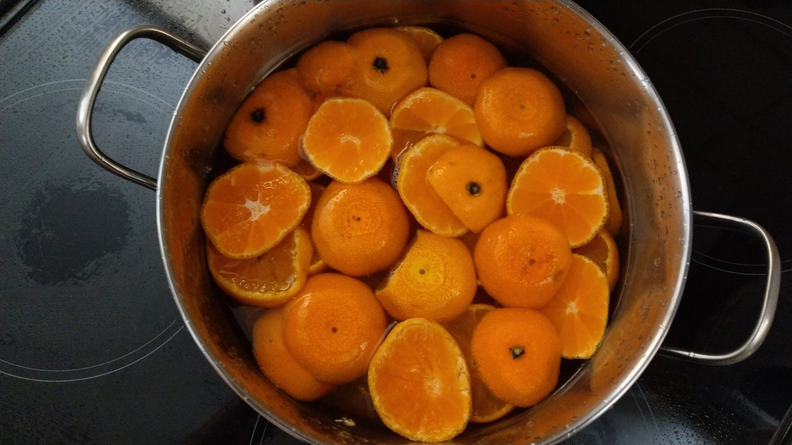 Mandarin orange slices simmering