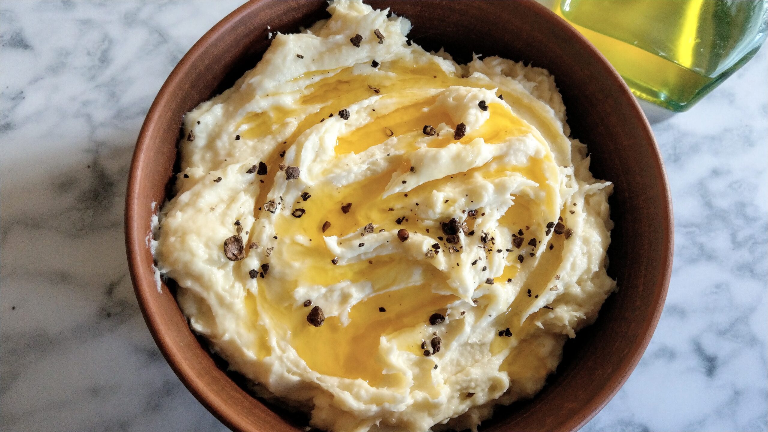 Parsnip puree with spiced butter and some coarse-ground pepper and allspice